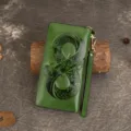Genuine leather long wallet in vintage green with embossed floral pattern and wrist strap. - Green