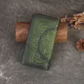 Vintage green embossed genuine leather long wallet with ethnic carved floral zipper closure. - Green