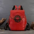 Red vegetable-tanned leather backpack with vintage floral pattern, stylish travel bag. - Red
