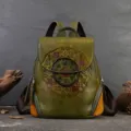Vintage vegetable-tanned leather backpack for women and men, embossed floral art design. - Green