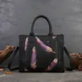 Genuine leather women's shoulder bag, retro tote with stylish feather embossed design. - Black