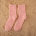Detailed view of cozy pink fuzzy coral fleece socks, soft winter warm sleep floor socks. - One Size / Dark Red