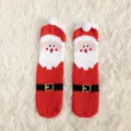 Fluffy coral fleece Christmas socks with cute Santa Claus design, warm and cozy for indoor home wear. - One Size / Santa Claus