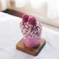 Cozy coral fleece women floor socks packaged in a cute cupcake shape for warm indoor home wear. - Dusty Rose & White
