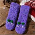 Cozy purple fuzzy fleece floor socks featuring green pom-poms and cute cartoon cat embroidery. - One Size / Bright Purple