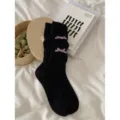 Chaussettes boules noires à volants pour femmes avec nœud violet, style collégien. - Taille unique / Noir