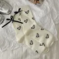 Women cute balletcore cream crew socks with black bow and heart knit pattern daily wear. - One Size / Cream Heart Ribbon