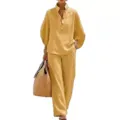 Detail view of women's casual linen two-piece set featuring button-up shirt and wide-leg pants. - Yellow