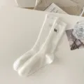 White ribbed mid-calf socks featuring delicate black bow embroidery, balletcore style. - One Size / Bow Accent - Natural White