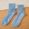 Soft fuzzy coral fleece winter floor socks with anti-slip grips in light blue color. - One Size / Women Denim Blue