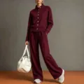 Detailed view of solid color stand collar cardigan sweatshirt and wide leg pants set. - Burgundy