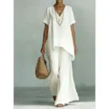Elegante completo casual bianco con top a maniche corte scollo V e lunghi pantaloni larghi. - Taglia S / Top E Pantaloni / Bianco