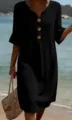 Detailed view of casual black V-neck midi dress with buttons for women resort wear - S / Dresses / Black