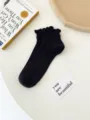 Black ruffle short socks for women, cute Japanese style ribbed low cut ankle socks apparel. - One Size / Cable Black