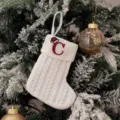 White knitted Christmas stocking with embroidered letter C, perfect holiday gift bag decor. - Embroidered Knitted Small Sock White C