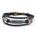 Close-up detail of vintage braided leather bracelet with alloy nameplate showing best friend text. - Best Friend Style