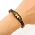 Bracciale in pelle PU con teschio vintage retrò da uomo in lega di bronzo antico - Stile Rilievo Doppio Teschio