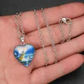 Men's silver tone wolf totem glass heart pendant necklace, detailed view of jewelry. - Classic Wolf Totem Style (AA365)