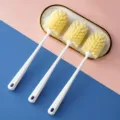 Long handled cup cleaning brush with white handle and dense yellow bristles for kitchen use - Basic Style