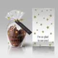 Transparent baking packaging bag detail view, gold stars pattern and English quote design. - White Background Gold Star