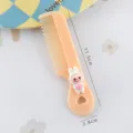 Cute mini rabbit hair comb for kids, portable plastic hair styling tool with cute design. - White