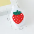 Brosse à cheveux pliante portable avec design 3D fraise mignonne et miroir de maquillage compact. - Fraise