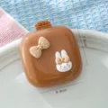 Cepillo de aire adorable con lazo de conejo y espejo, cepillo de pelo compacto para estudiantes. - Conejo con Lazo / Marrón