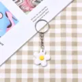 Portachiavi carino con fiore bianco in metallo e anello, ciondolo decorativo per borsa da donna. - Stile Cerchio Argento / Piccolo Fiore Bianco
