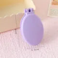Brosse à cheveux pliante violette compacte avec miroir rond intégré, peigne de poche portable. - Emballage Individuel / Peigne Pliant Violet
