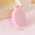 Peigne macaron pliable rose avec miroir rond portable, brosse de voyage anti-nœuds compacte. - Emballage Individuel / Peigne Pliable Rose