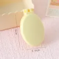 Brosse à cheveux pliante macaron avec miroir de maquillage, peigne de voyage compact. - Emballage Individuel / Peigne Pliable Jaune