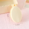 Brosse à cheveux pliante Macaron avec miroir rond peigne de massage anti-nœuds femme quotidien - Emballage Individuel / Peigne pliable jaune crème