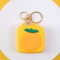 Cute yellow silicone coin purse keychain with orange design, compact zipper mini wallet. - Orange