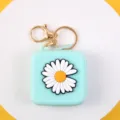 Cute mint green silicone coin purse with daisy flower pattern and gold keyring keychain. - Daisy