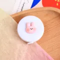 Cinta métrica mini de conejo rosa, regla flexible portátil para costura y medidas corporales. - Cinta métrica de conejito