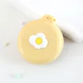 Mini brosse à cheveux pliante portable avec miroir, mignon peigne de massage coussin jaune. - Peigne à cheveux œuf sur le plat