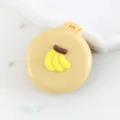 Jolie petite brosse à cheveux pliable avec miroir, peigne de voyage banane jaune portable. - Peignes à cheveux banane