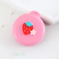 Jolie brosse à cheveux de poche pliante avec miroir, mini peigne de massage fraise portable. - Peignes à cheveux fleur et fraise