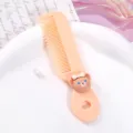 Cute cartoon bear kids hair comb portable mini plastic hair styling tool for girls daily care. - Bear with Bow