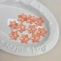 Cuentas de copo de nieve acrílico rosa translúcido dijes para hacer joyas DIY llaveros. - Naranja Claro