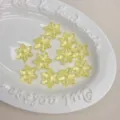 Cuentas de copo de nieve acrílicas translúcidas amarillas cuentas espaciadoras para hacer joyas DIY - Amarillo claro