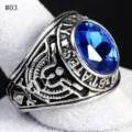 Vintage US military style alloy ring with blue crystal stone and detailed eagle relief. - Size 7 / Blue