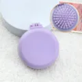 Mini brosse à cheveux pliante portable avec miroir en joli coloris bonbon violet clair doux. - Emballage Individuel / Modèle mat - Peigne violet