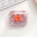 Schattige strik contactlensetui draagbare doorzichtige companion doos voor dagelijks gebruik. - Oranje brillenkoker met strik