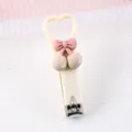 Cute mini heart nail clipper with pink bow and cherry decor, portable home manicure tool. - Cherry Nail Clipper / Beige