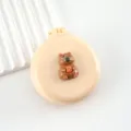 Joli capybara brosse à coussin d'air pliable mini portable brosse de massage miroir beige - Jaune crème - Cochon d'Inde tenant une orange