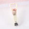 Cute cartoon heart nail clipper with mini strawberry bow design for daily home care. - Strawberry Nail Clipper / Beige