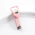 Süßer rosa herzförmiger Nagelknipser mit 3D Pfirsich Dekor tragbarer Mini Nagelknacker - Pfirsich-Nagelknipser