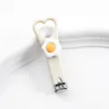 Simpatico tagliaunghie a forma di cuore con uovo, mini strumento di manicure portatile. - Tagliaunghie a uovo al tegamino