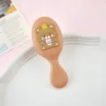 Jolie mini brosse à cheveux dessin animé coussin portable brosse de massage cheveux longs - Ours en peluche